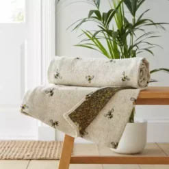 Dunelm Bee Jaquard Throw Natural